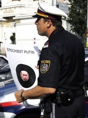 Провокационный плакат с изображением В.Путина