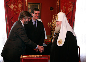 Патриарх с президентом Лувра и послом Франции