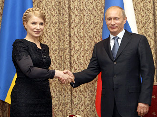 Юлия Тимошенко и Владимир Путин 22 мая 2009 г. в Астане (Фото с сайта <a class="ablack" href="http://newsru.com/">Newsru.com</a>)