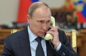 Путин говорит по телефону