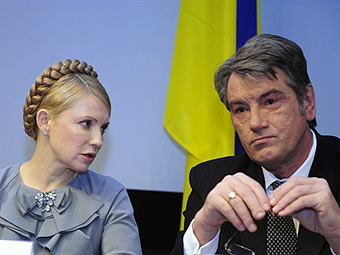 Юлия Тимошенко и Виктор Ющенко (Фото с сайта <a class="ablack" href="http://www.lenta.ru/">Lenta.Ru</a>)