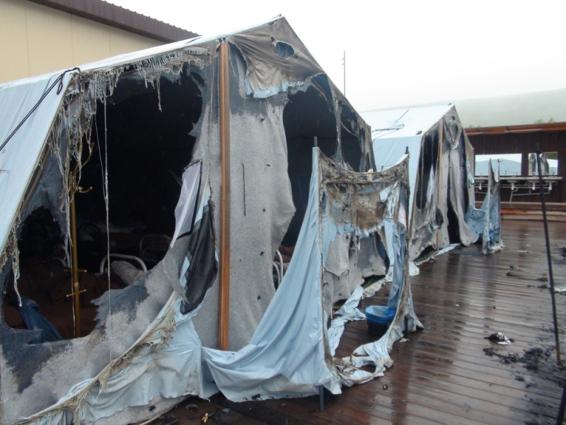 Палаточный лагерь, в котором в результате пожара погибли четверо детей